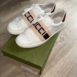 White Sneakers with Red and Black Stripe